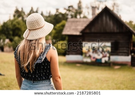 Stara Lubovna Castle and an open air folk museum, Slovakia Young woman tourist traveler. Slovakia travel cultural heritage