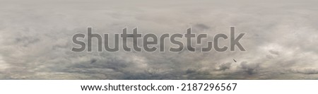Overcast sky panorama on rainy day with Nimbostratus clouds in seamless spherical equirectangular format. Full zenith for use in 3D graphics, game and for aerial drone 360 degree panorama as sky dome. Royalty-Free Stock Photo #2187296567