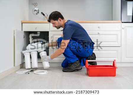 Water Purification Filter Install And Maintenance Service Royalty-Free Stock Photo #2187309473