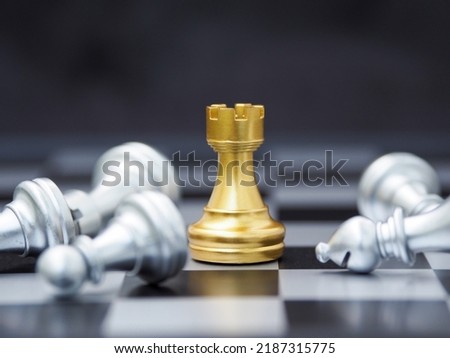 Gold Rook or Castle Tower Chess for ideas and competitions and strategies. business success concept Using strategies to win Royalty-Free Stock Photo #2187315775