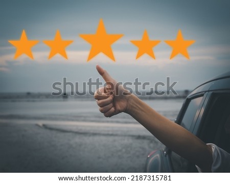 The girl who was reaching out from the car and giving a great thumbs up. Rating of the restaurant, accommodation, business, five-star rating, the best.