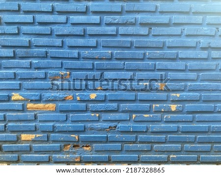 Blue brick weathered wall background