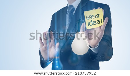 Double exposure of Businessman hand working with 3d light bulb and great idea concept 