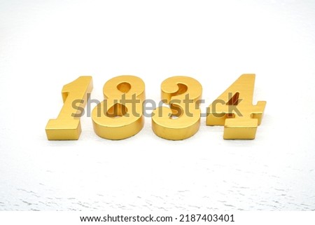    Number 1834 is made of gold painted teak, 1 cm thick, laid on a white painted aerated brick floor, visualized in 3D.                                
