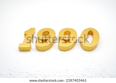   Number 1990 is made of gold painted teak, 1 cm thick, laid on a white painted aerated brick floor, visualized in 3D.                                
