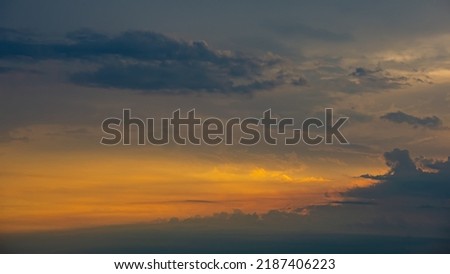 Orange sky and clouds at sunset. Summer season. Web banner.