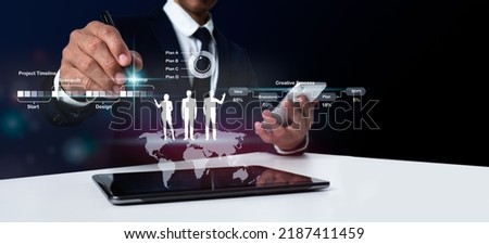 Future business concept. The businessman indicates the communication technology business plan symbol. Plan A, Plan B, C, and D, as well as the company timeline and process.