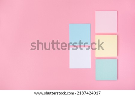 The concept of Back to school. School or office stationery on a pink background. Online education.