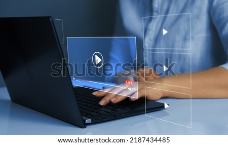 Business person watching a live stream.Online live stream window. Video streaming on internet concept.	 Live digital stream multimedia player.