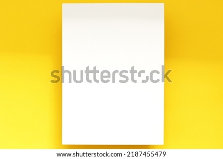 simple template of white paper sheet on yellow background