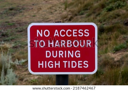 No access to harbour signboard situated at a coastal harbour location