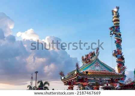 Traditional Chinese style architecture at Thai-Chinese Cultural Center in Thailand. Image has visible sensor or lens dust. Image have noise, luminance noise, sharpening noise, or film grain