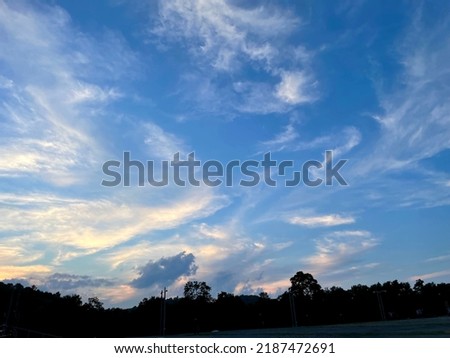 Blue Yellow White Sunset Marbled Sky With Black Forest Silhouette in Blue Ridge Mountains North Carolina Appalachia in Summer High Altitude