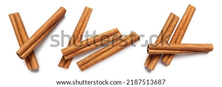 Set of cinnamon sticks, isolated on white background Royalty-Free Stock Photo #2187513687