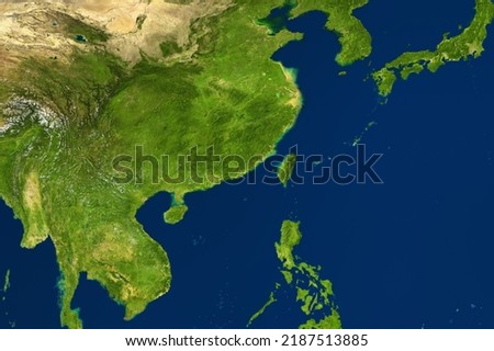 East Asia map in satellite photo, China and Taiwan in center. Physical detailed map of Eurasia southeast, topography of China. Green terrain, blue seas and ocean. Elements of image furnished by NASA.