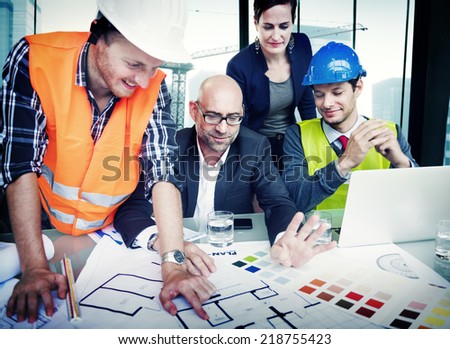 Business People and Architects in a Meeting