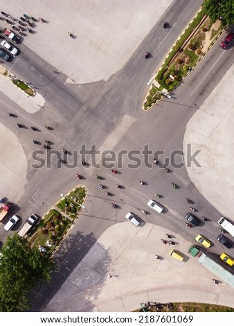 A view of instersection road in Batam City, Indonesia. this photo was shot in the afternoon where the traffic is high