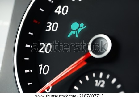 Closeup view of dashboard with warning icon check airbag system in car Royalty-Free Stock Photo #2187607715
