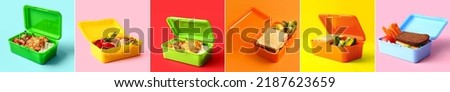Set of lunch boxes with tasty food on color background Royalty-Free Stock Photo #2187623659