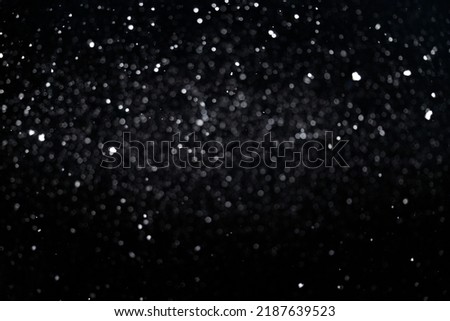 Out of focus snowfall for use as a texture overlay layer in your project. Snow layer for your winter design.