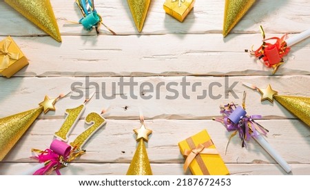 Beautiful colorful card on the background of white boards happy birthday in golden hues copy space. Beautiful ornaments and decorations of gold color festive background. Happy birthday number 17.