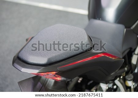 Sporty black leather seats of big bikes. Sleek with every move Reduced wind resistance through mechanical design.