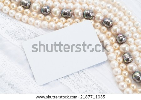 Pearl jewellery styled stock scene, for wedding invitation, product showcase or styled presentation with copy space, on blank card