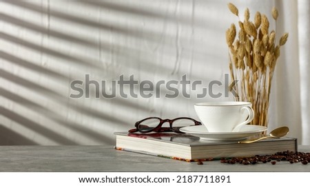 A table in the kitchen with a free space and sunlight shining on the wall