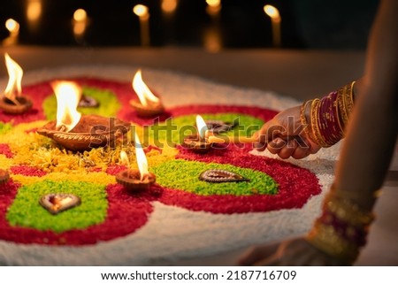 Traditional diya lamps lit during diwali celebration Royalty-Free Stock Photo #2187716709
