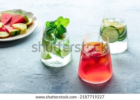 Summer cocktails. Cold drinks with fresh fruits. Healthy mocktails. Glasses of lemonade with ice