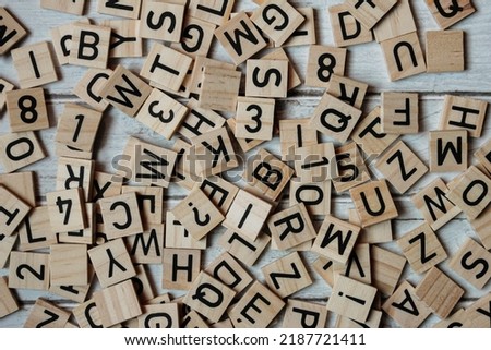Word letters arranged on a wooden background	