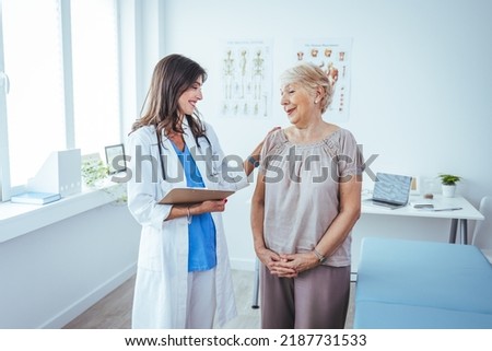 Portrait of female doctor explaining diagnosis to her patient. Female Doctor Meeting With Patient In Exam Room. Cropped shot of a medical practitioner reassuring a patient