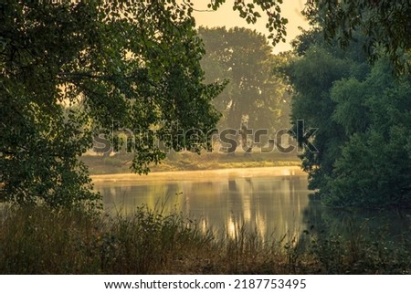 Early morning river.  fog trees. sunlight mist  water. Olanesti Moldova Dniester river reflection, beautiful   summer landscape sunrise quiet fishing spot forest