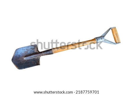 Small rusty shovel .infantry small shovel isolated on white background .small shovel for tourism and earthworks on a white background Royalty-Free Stock Photo #2187759701