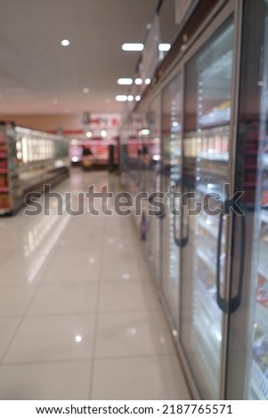 Blurred image of frozen food section in Supermarket Royalty-Free Stock Photo #2187765571