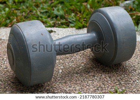 blue-grey dumbbells for exercise equipment at home