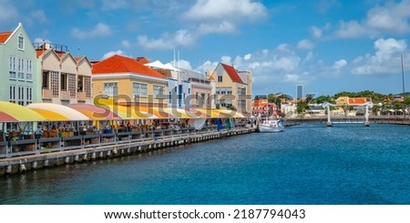 Local market and colorful buildings at the Sha Caprileskade in Punda, Willemstad, Curacao. Royalty-Free Stock Photo #2187794043