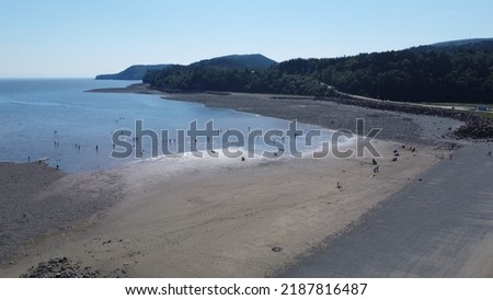 Beautiful picture of the Bay Of Fundy tide coming in on Alma Beach in New Brunswick.