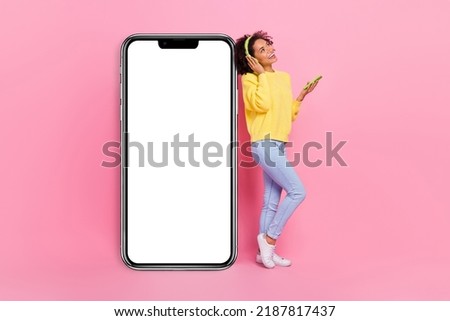 Full body profile side photo of young lovely girl radio melody sound mobile look empty space isolated over pink color background