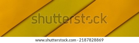 Yellow colored paper. Abstract background.