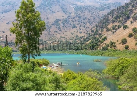 Mountain lake with turquoise water. Beautiful mountain landscape with a lake. High quality photo
