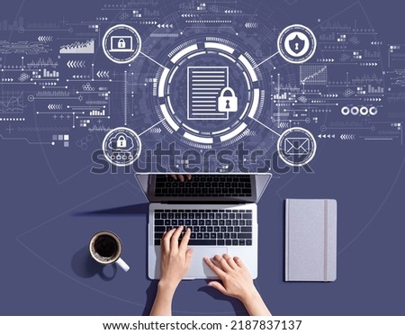 Data protection concept with person using a laptop computer