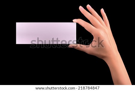 Hand hold blank business card on black background