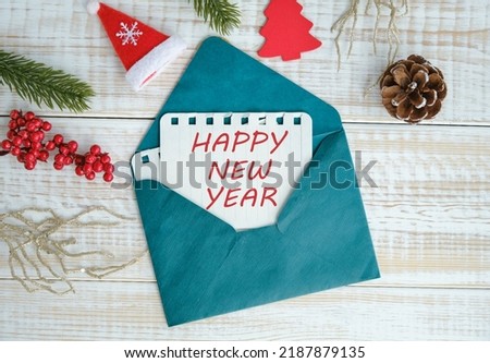 Happy New year displayed on a vintage lightbox with decoration for New Year's Eve, concept image.
