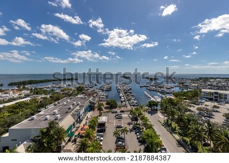 Aerial image of a residential neighborhood with an ocean in the background in FL USA Miami beach drone view