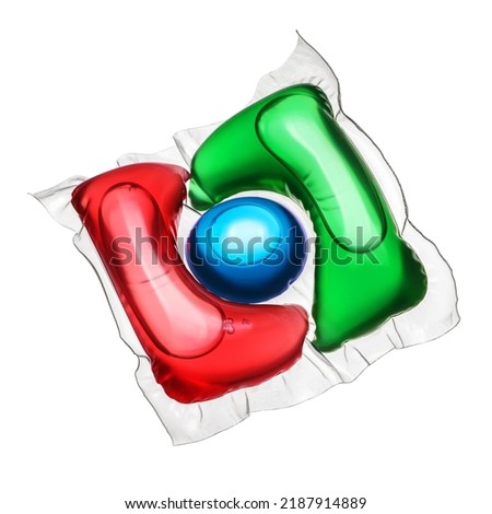 Laundry detergent pod blue, red and green colored isolated on white background
