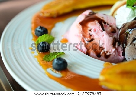 ice cream and fruit on plate