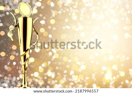 Golden award statue on fireworks background. Success and victory concept.