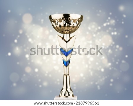 Golden award statue on fireworks background. Success and victory concept.