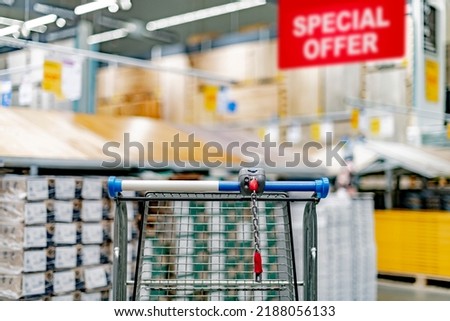 A shopping cart in a home improvement store.